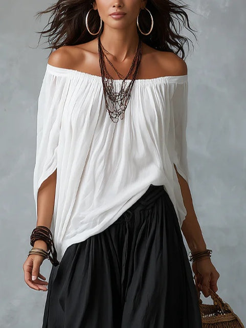 Ensemble blanc avec haut Ã©paules dÃ©nudÃ©es et pantalon style lanterne